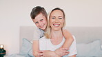 Face, boy and hug mom with smile in home for love, care and bonding together with joy, support and relaxing with son. Portrait of happy young child embrace woman to celebrate mothers day in bedroom 