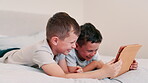 Children, tablet and watching on bed, fun and silly cartoons or series, movies and comedy. Happy boys, kids and laughing for games, digital and streaming on technology, relax and funny videos or meme