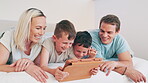 Kids, parents and tablet on bed for funny video, online games and relax together with home education or meme. Excited family, mother and father with children laughing on digital technology in bedroom