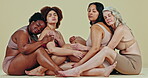 Body positive, diversity and women hug, relax and together with self love, beauty and solidarity care. Woman empowerment, lingerie shape size and friends group sitting on floor on studio background