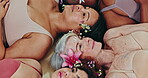 Face, women and flowers in studio with diversity, self love and laying with smile, aesthetic and underwear. Top View, people or floral hair for beauty, art and cosmetic with glow, skincare and spring