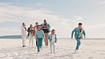 Beach, running and grandparents, parents and children for bonding, playing and relax in nature. Family, travel and mom, dad and kids and senior couple by ocean on holiday, vacation and adventure