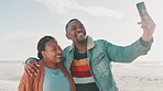 Couple, beach and selfie with smile for vacation, holiday or adventure with embrace and freedom. Black people, man or woman by sea or ocean with smartphone for experience, hug or travel for memory