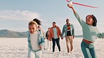 Family, airplane and kids running on beach with parents for bonding, playing and relax in nature. Grandma, grandpa and mom, dad and children with toys by ocean for holiday, vacation and adventure