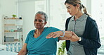 Physical therapy, rehabilitation or senior woman doing arm exercise, orthopedic workout or healing joint pain. Injury, clinic patient or physiotherapist test shoulder mobility, progress or assessment