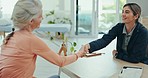 Physical therapist consultation, old woman and patient handshake, welcome and consulting on senior rehabilitation. Happy chiropractor, shaking hands or elderly client greeting for retirement services