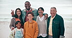 Big family, face or happy on beach with love, travel and bonding on vacation, holiday or adventure by ocean. Interracial, portrait and parents with grandparents at sea for relationship and smile