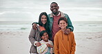 Family, face or smile on beach with hug, love and bonding on vacation, holiday or adventure by ocean. Interracial, parents and kids with portrait at sea for experience, relationship or care and happy