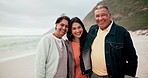 Beach, face and woman with senior parents in nature for hug, support or bonding together. Happy family, portrait and old people with female at sea for retirement, freedom or travel vacation in Bali