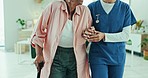 Walking, help and caregiver with senior woman for assisted living, support and medical care. Healthcare service, retirement and nurse with elderly patient with crane for disability in nursing home
