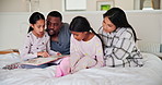 Parents, girl children and bed with book, smile and reading with interracial love, care and bonding in house. African father, mother and daughter kids in bedroom, listening and story at family home