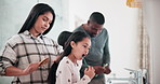 Parents, girl kids and brushing hair in bathroom, support and hygiene for teeth, mouth and love in morning. Dad, mother and daughter kids with toothbrush, together and helping hand in family house