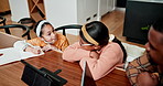 Family, homework and parents at home with school help, kindergarten and mom with learning. Study, student and young girl with mother and father together with support and care on a dining room table