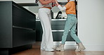 Home, dancing and mother with girl, love and playful with weekend break, joy and bonding together. Family, mama and kid in a kitchen, energy and apartment with support, silly and goofy with fun