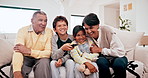 Family, grandparents and children watching tv together on the sofa in a living room of their home for visit. Portrait of a senior man and women with kids for a movie, entertainment and remote control