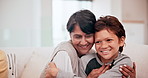 Woman, hug and child with grandparent on sofa for love at home to relax with comfort. Grandmother, senior female person and young boy embrace for bonding and care in lounge with retirement 
