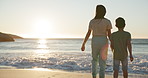 Back, beach or holding hands with a brother and sister on the sand by the ocean at sunset together. Family, love or vacation with a girl and boy sibling outdoor on the coast for summer holiday