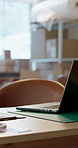 Laptop, box and empty warehouse for logistics, supply chain and clipboard on desk for sales inventory. Computer pc, cardboard package or e commerce with technology, packaging and shipment in workshop