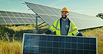 Engineering, man and smile with solar panels outdoor for renewable energy, maintenance and electrical grid. Photovoltaic, person or employee with happiness on grass for clean electricity in nature
 

