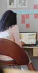 Business, woman and back with laptop and scroll, website search or digital marketing for creative agency. Employee, person and rear view with computer pc, internet and design planning at office desk