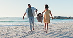 Beach, swing and parents with child in nature for freedom, fun and bonding outdoor. Love, happy family and kid holding hands with people at the sea for lifting, games and playing on summer vacation