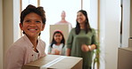 Family, boxes and excited for real estate, new home or property investment in hallway of house. Mortgage, man and woman with children, cardboard and package for moving in, apartment or relocation joy