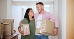 Couple, boxes and happy for real estate, homeowners or property investment in hallway of new house. Mortgage, man and woman with hug, cardboard and package for new home, apartment or relocation joy
