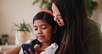 Mother, child and cellphone or reading talking in home or
online entertainment, learning or movie streaming. Indian girl, woman and video watch or scroll information on social media, chat or question