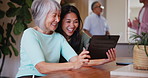 Smile, senior mother and daughter on tablet in home, funny laugh or watch video on social media, internet or meme on digital app. Asian mom, adult woman and technology, happy family together or relax