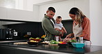 Baby, love and a couple cooking in the kitchen of their home together for health, diet or nutrition. Food, smile or happy with a mother, father and infant child using ingredients for supper or a meal