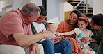 Big family, baby and parents play on sofa in home, bond and smile together. Mother, father and newborn child with grandparents in living room, laughing in healthy relationship and care, love or talk