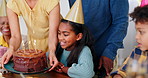 Birthday cake, family and children with grandmother for celebration, happy party and excited for special day. Senior woman, kids and interracial people giving chocolate dessert with candles at home