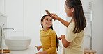 Bathroom, children and brushing hair with girls, morning and happiness with grooming, routine and bonding together. Home, sisters and kids with a brush, conversation and help with style, care or love