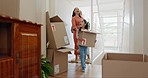 Property, family and children carrying boxes for relocation to a new home for investment or growth. Real estate, mortgage or moving house with a mother, father and kids in their together apartment