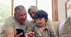 Phone, grandparents and child on sofa for game, elearning or online education for development in living room. Family, people and boy kid with smartphone on couch for learning, teaching and relax