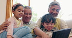 Tablet, grandparents and children on sofa for elearning, games or online education for development in living room. Family, people and kids with touchscreen on couch for learning, teaching and relax