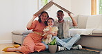 Family, insurance and parents with their daughter under a cardboard roof for safety, security or trust. Portrait, love or smile with a mother, father and girl in the living room of a home together