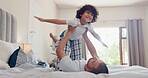 Father, child and airplane in home happy for play connection, childhood fun or morning routine together. Man, son and bed for flying fantasy game or trust activity, balance lift or parenting bonding