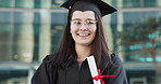 Face, closeup and woman in laughter by graduation, happy and student achievement of university degree on campus. Young person, portrait or diploma award in proud, graduate or college smile in vision