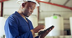 Black man, tablet and engineer at warehouse for maintenance, inspection or research on site. African male person, contractor or technician working on technology in online search or monitoring factory