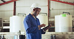 Black man, tablet and technician at warehouse for inspection, research or maintenance on site. African male person, contractor or engineer working on technology in online search or monitoring factory