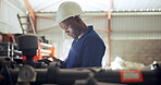 Tablet, manufacturing and equipment with a black man engineer in a factory for inspection or maintenance. Technology, industry and machinery with a contractor in a plant or warehouse for repair