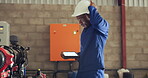 Man, tablet and machine engine repair for irrigation system check or internet question, confused or mistake. Black person, helmet and digital maintenance service, safety control or water inspection