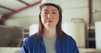 Serious woman, face and engineer with hard hat at warehouse or factory for maintenance or career ambition. Portrait of female person, contractor or technician with safety helmet on site at plantation