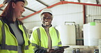 Planning, tablet and construction worker people in a factory for planning or discussion. Diversity, communication and engineer team together in a warehouse or plant for professional manufacturing