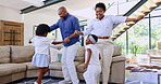 Happy, living room and parents dance with kids for bonding, relax and healthy relationship at home. Family, music and mom, dad and children having fun, learning and teaching dancer moves on weekend