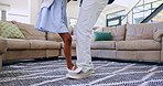 Happy, dance and feet of father with girl for bonding, relax and healthy relationship at home. Family, parents and dad with child having fun, love and teaching dancer moves on weekend in living room
