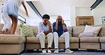 Jump, children parents on a sofa with stress, headache or depression at home with mental health crisis. Energy, chaos and people in living room overwhelmed by hyper kids, adhd or parenting burnout
