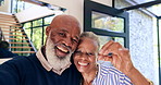 Happy, senior black couple and face with keys in new home, real estate or property investment together. Portrait of mature African man and woman smile with access to apartment building, door or house