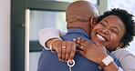 Couple, hug or happy with house keys of new home, real estate or achievement for property investment. Black people, man or woman and embrace or smile for support, ownership or relocation to apartment